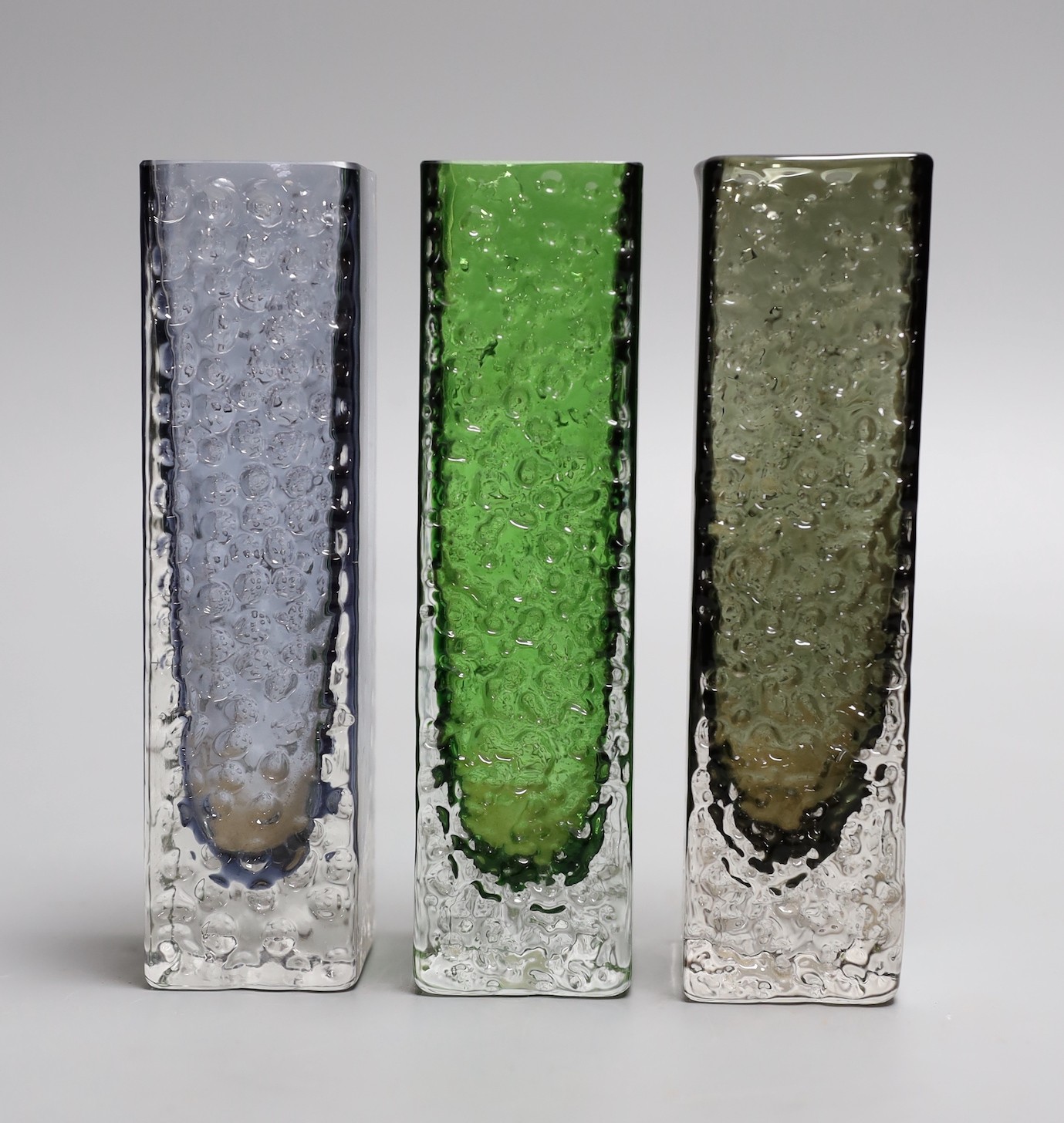 A trio of Whitefriars 'Nailhead' vases, model 9683, designed by Geoffrey Baxter, various colours, 17cm high.